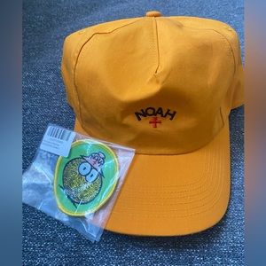 Noah 5 panel baseball hat orange yellow in with monsters patches in green